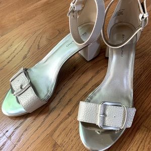 Bandolino Light Metallic buckled sandal.Ankle strap, 2” heel in pebbled finish.